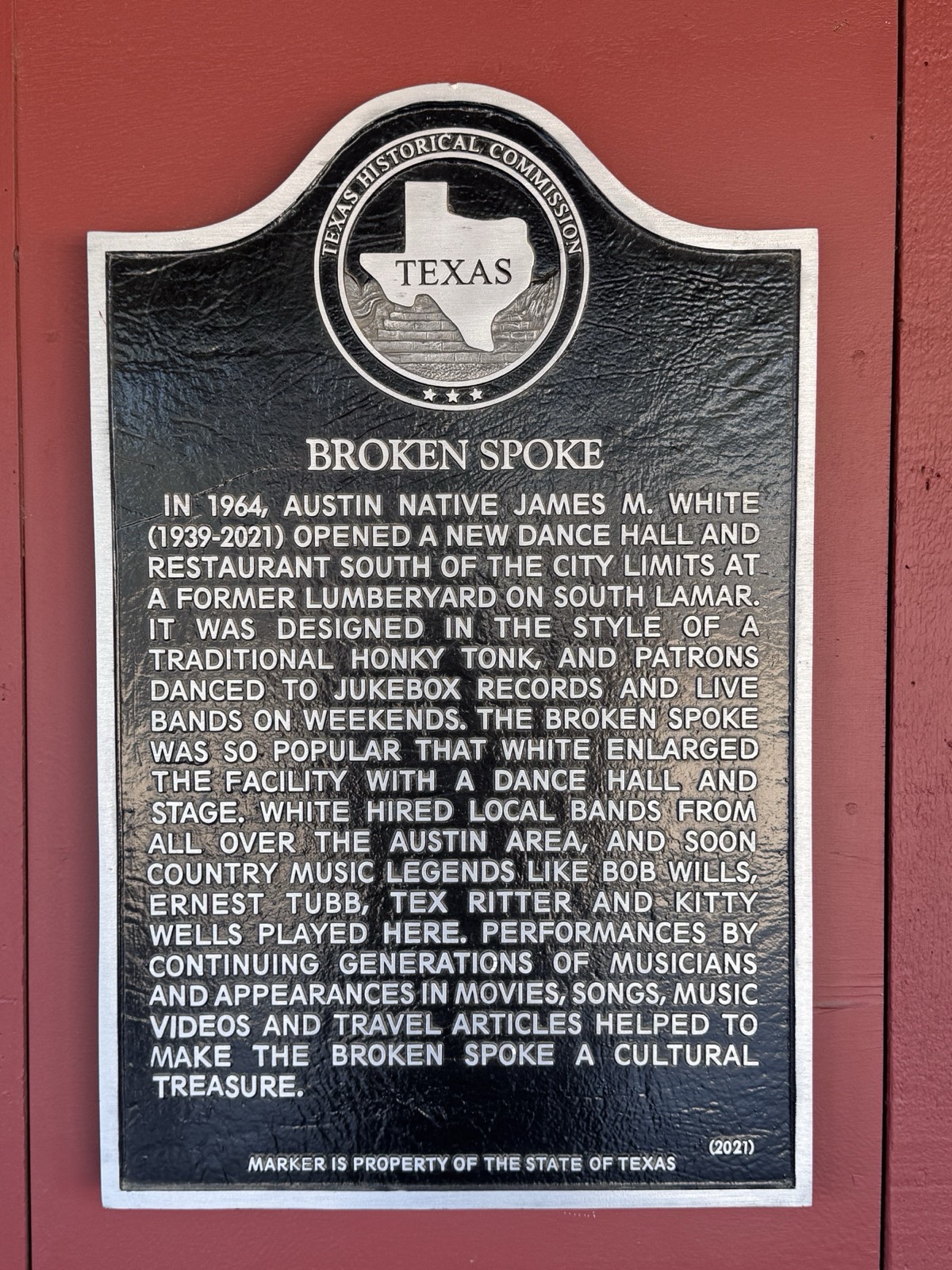The Texas Historical Commission marker for the Broken Spoke